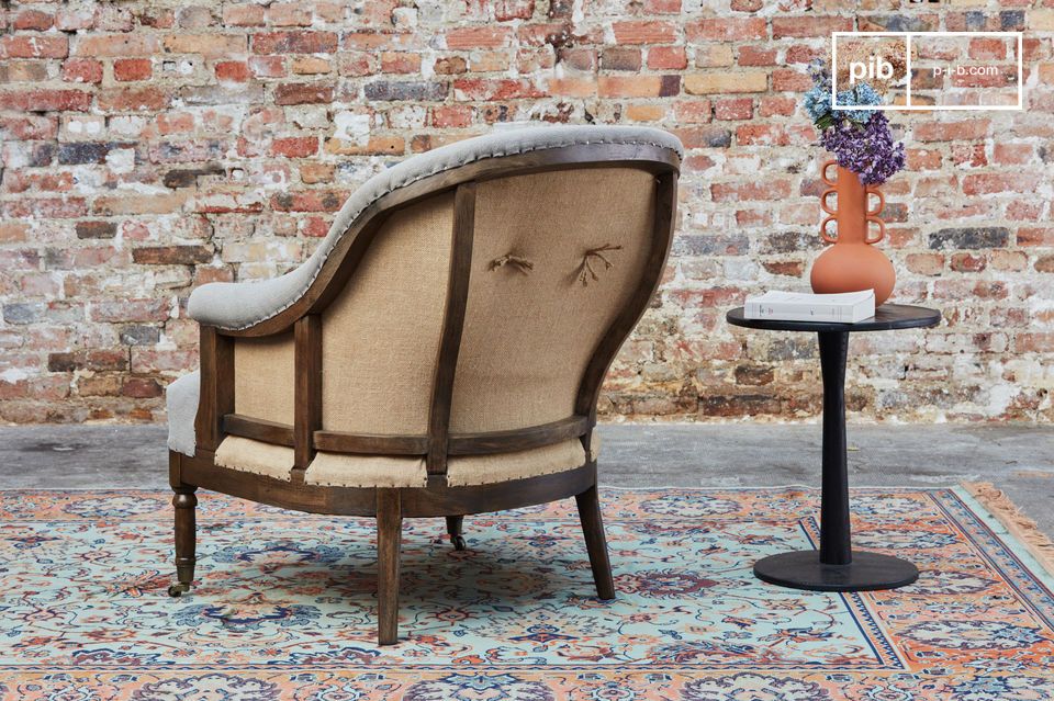 El sillón redondo Léonie es un bonito sillón de tela gris que aportará un encanto rural y